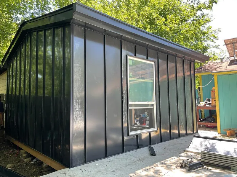 Black standing seam metal wall panels for Metal Roof Installation in Garrett