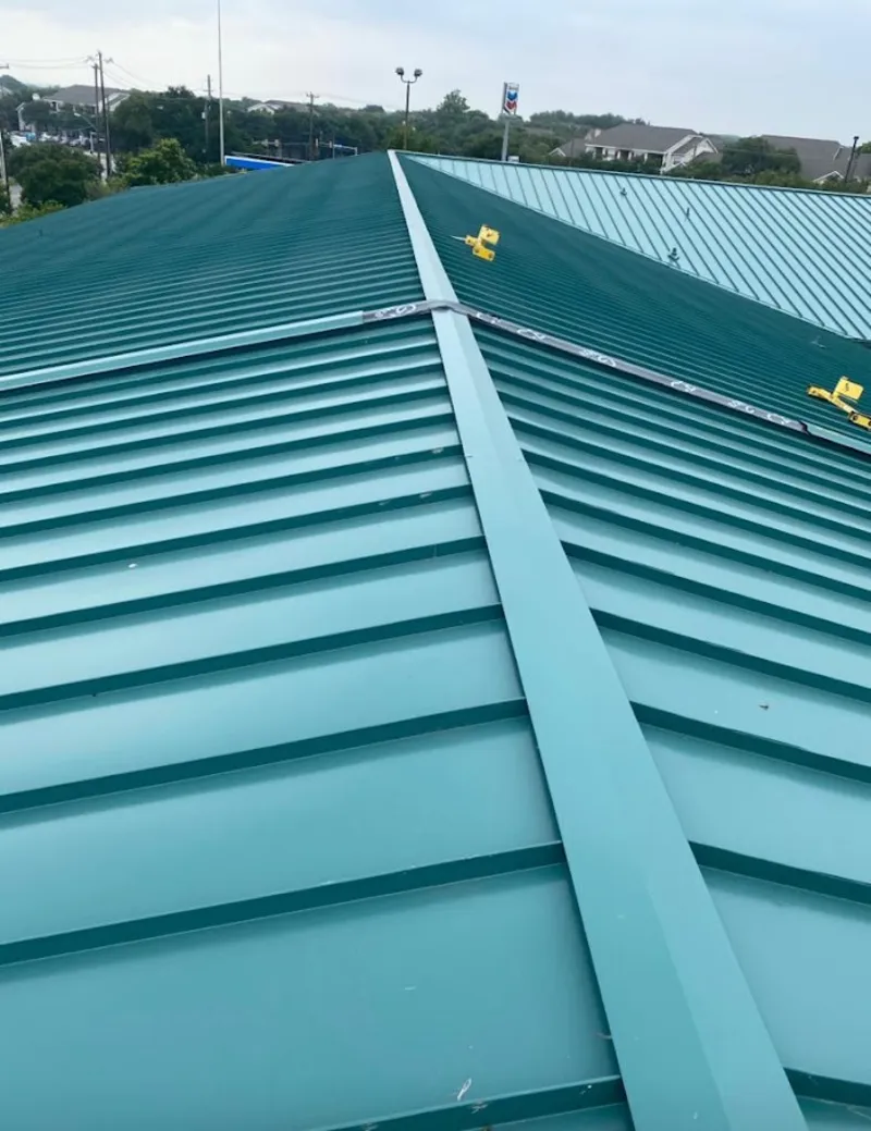 Green commercial metal roof ridge and valley for Metal Roof Repair in Garrett